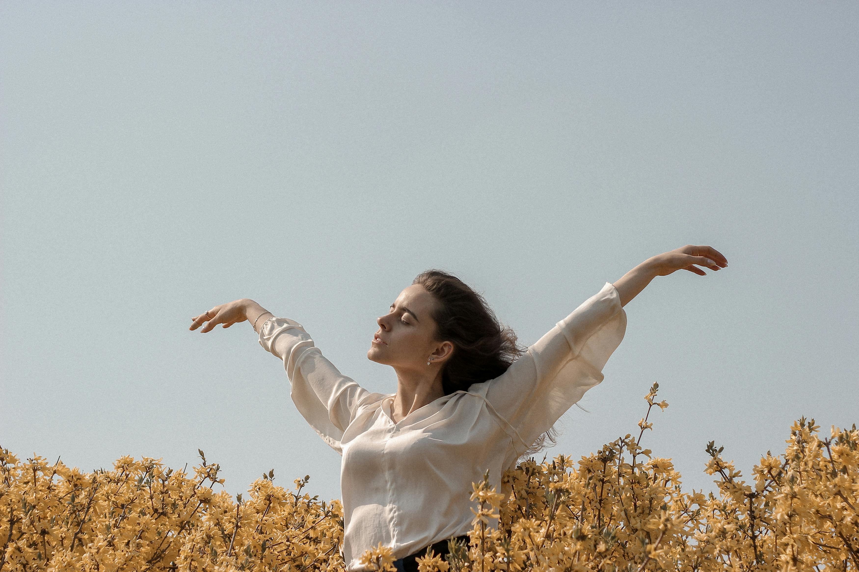 Happy woman in flower field