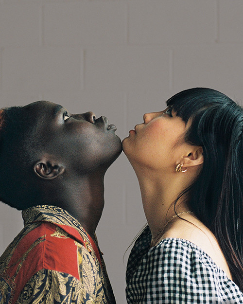 Insight - two people standing face to face against a dark background