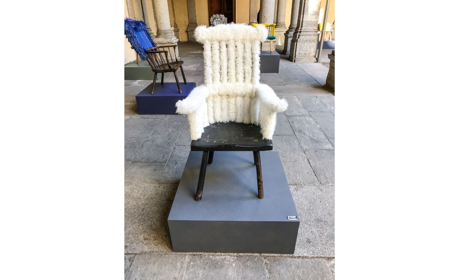 Loewe chair on show at the courtyard of Palazzo Isimbardi